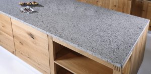 Strasser countertop grey stone on oak kitchen island