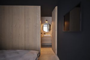 Bedroom with oak wall