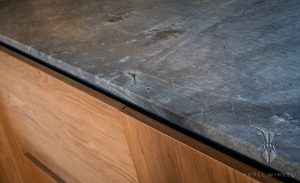 Oak kitchen with stone countertop