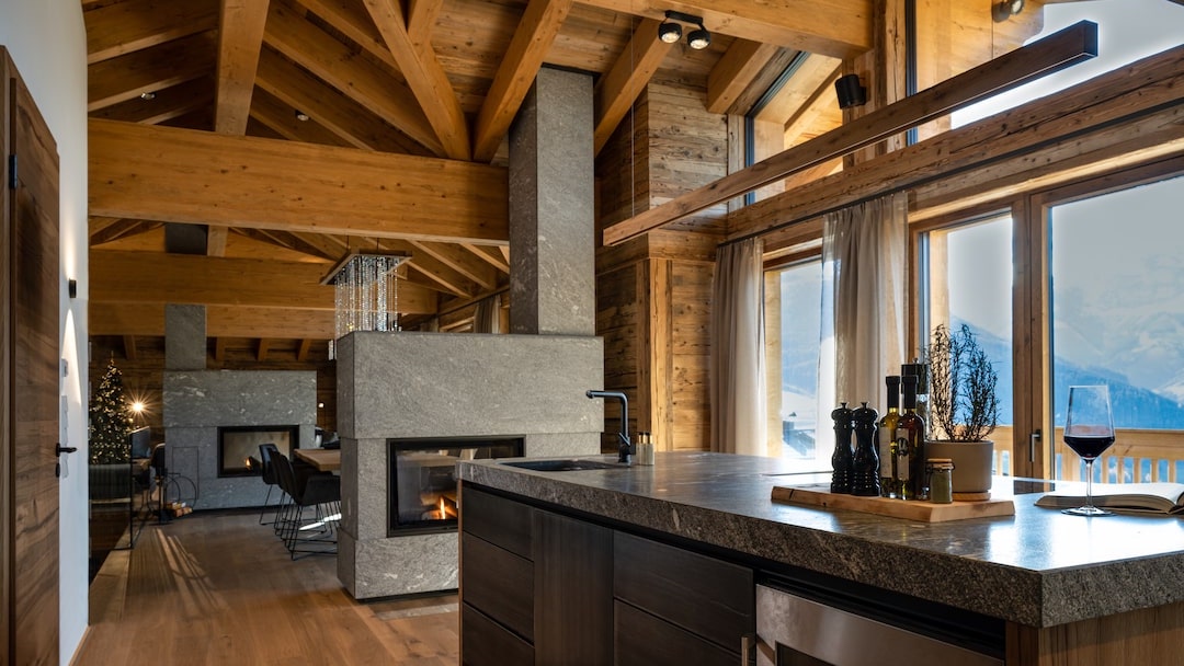 Chalet livingroom stone fireplaces
