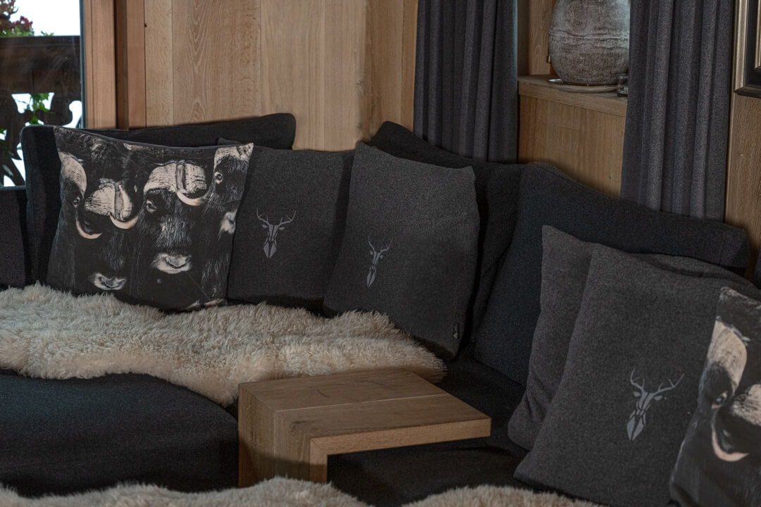 Loaden couch with woolen stag pillows