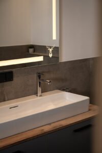 Bathroom mirror with an illuminated stag.