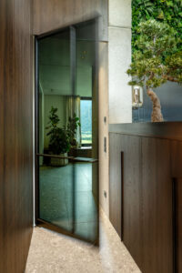 Open smoked glass door