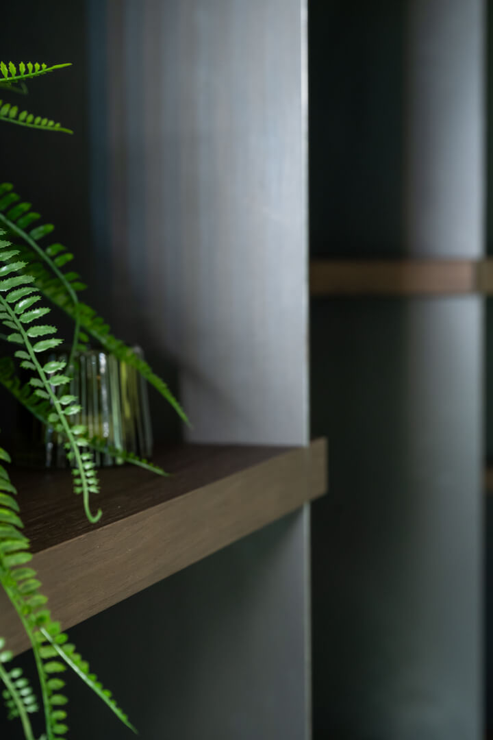Steel bookshelf with smoked oak shelf