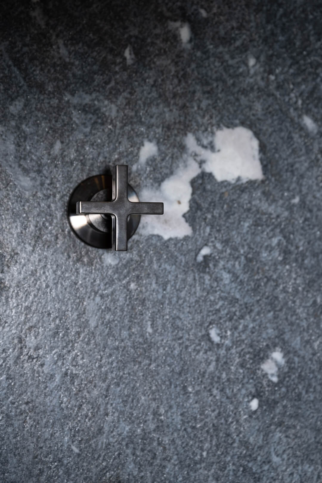 Luxury stone shower with high-end Axor fittings in chalet bathroom.