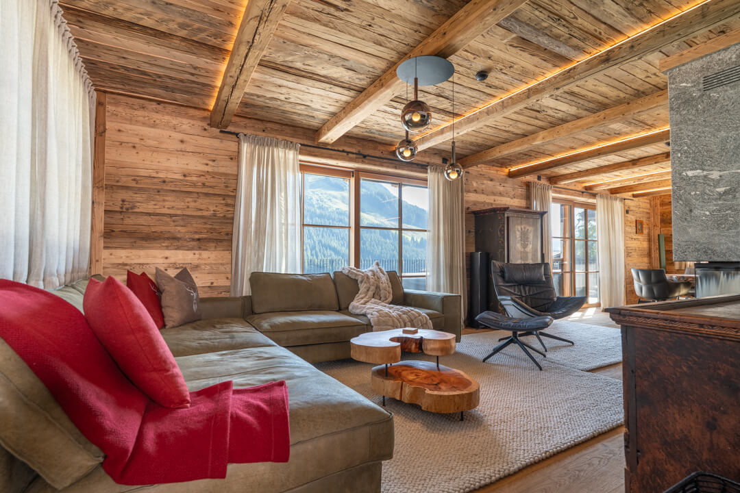 Elegant Chalet Living Room Featuring Reclaimed Wood Accents
