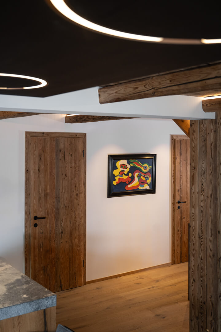 Oak doors in luxury alpine chalet interior.