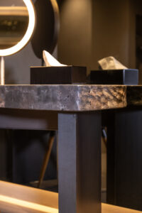 Luxury makeup table with massiv stone countertop.