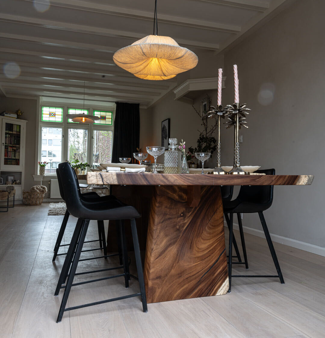 Acacia table made from a single solid top and matching solid end panel.