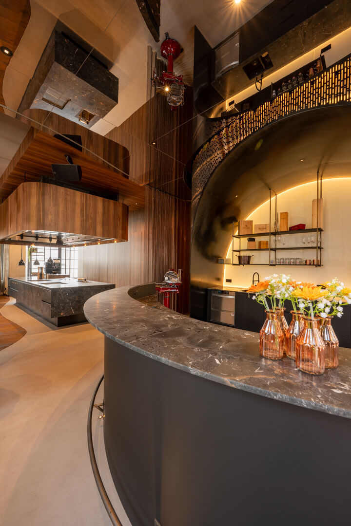 Hotel bar counter in natural grey stone.