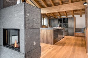 Rauriser stone fire place and kitchenisland, oak flooring.