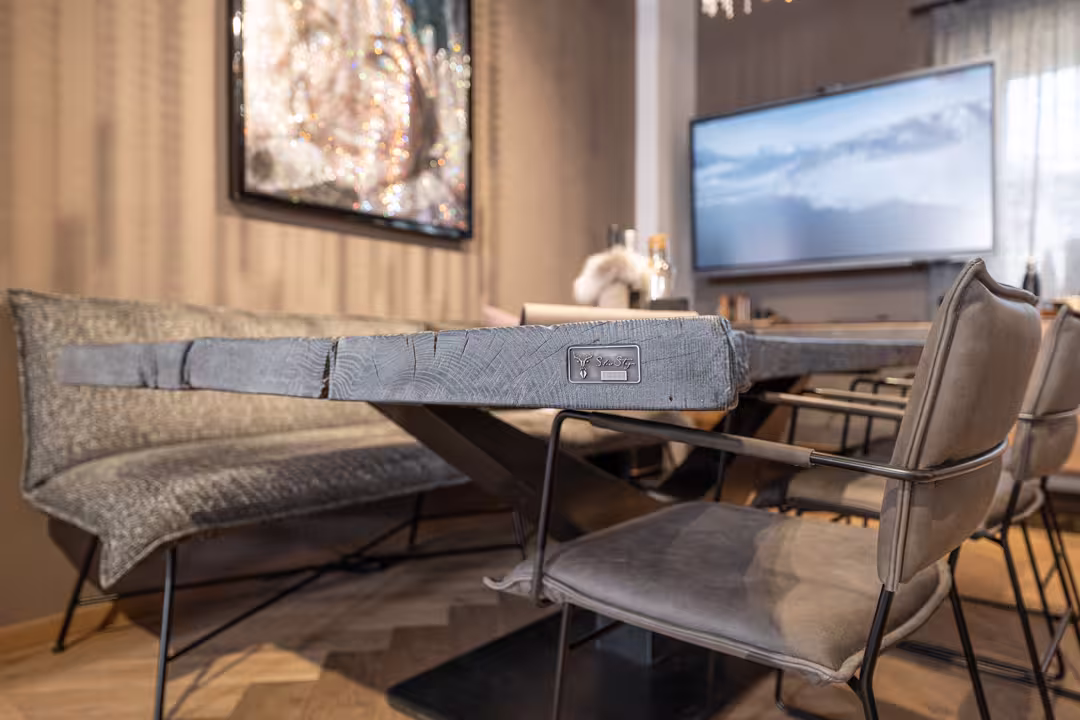 Smoked Silver Stag table with leather chairs