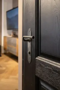 Hand-forged steel door handles