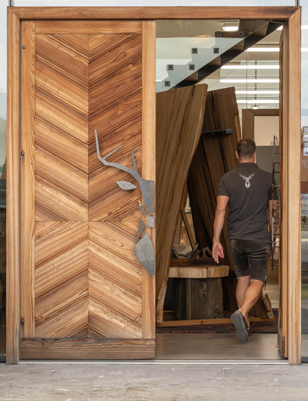 Kröll.Winkel door entree wooden door with steel stag