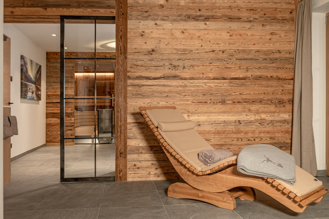Wellness with wooden lounge chair